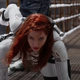 Scarlett Johansson’s Black Widow does a classic hero landing in her solo film while wearing her while superhero suit.